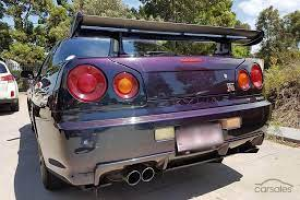 A stunning R34 V-Spec for only $500,000, in a very rare gorgeous colour.